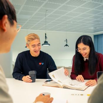 Two students studying in the ECU library