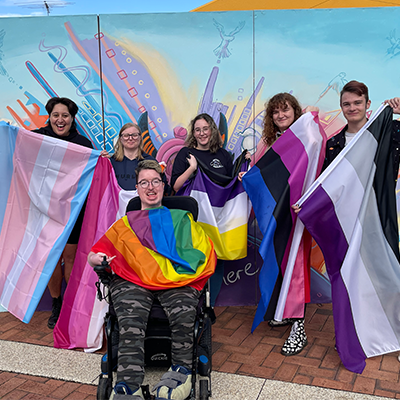 Students holding pride flags