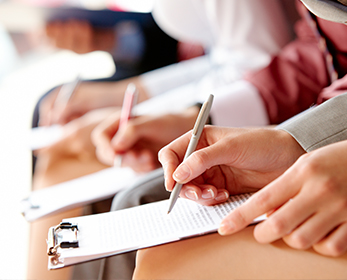 Students making notes during class