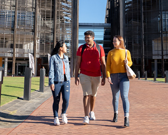 Students at ECU Joondalup campus in front of Building 1's imposing architecture.  