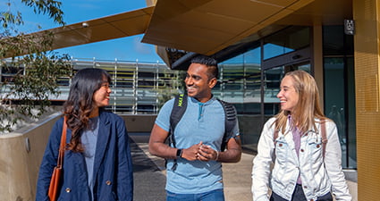 Group of students walking on campus